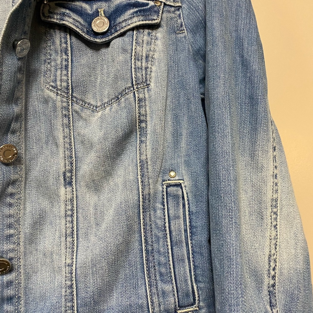 White House Black Market Jean jacket with crystal stud detail